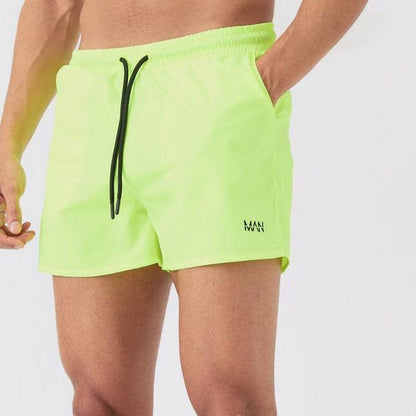 BM Men's Logo Embroidered Activewear Swim Shorts Men's Shorts Umer A Latif Yellow XS 